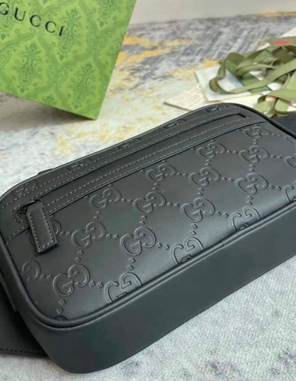 Monogram-debossed Leather Cross-body Bag